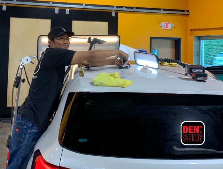 dent shop employee working